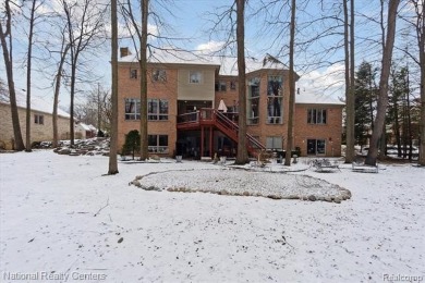 Location, location, location! This five-bedroom, four-full-bath on Prestwick Village Golf Club in Michigan - for sale on GolfHomes.com, golf home, golf lot