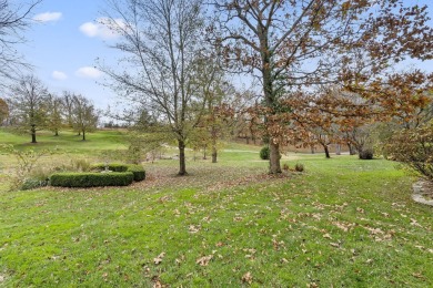 Welcome to this extraordinary 5-bedroom, 4.5-bath sanctuary on Millwood Golf and Racquet Club in Missouri - for sale on GolfHomes.com, golf home, golf lot