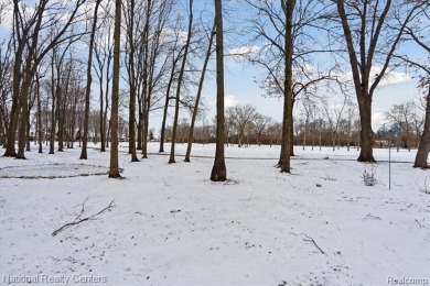 Location, location, location! This five-bedroom, four-full-bath on Prestwick Village Golf Club in Michigan - for sale on GolfHomes.com, golf home, golf lot