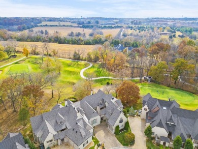 Welcome to this extraordinary 5-bedroom, 4.5-bath sanctuary on Millwood Golf and Racquet Club in Missouri - for sale on GolfHomes.com, golf home, golf lot