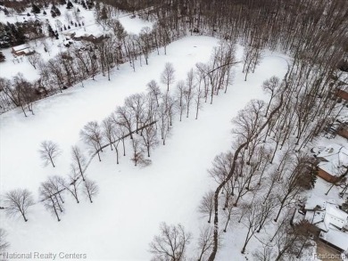 Location, location, location! This five-bedroom, four-full-bath on Prestwick Village Golf Club in Michigan - for sale on GolfHomes.com, golf home, golf lot