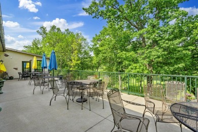 Welcome to this extraordinary 5-bedroom, 4.5-bath sanctuary on Millwood Golf and Racquet Club in Missouri - for sale on GolfHomes.com, golf home, golf lot