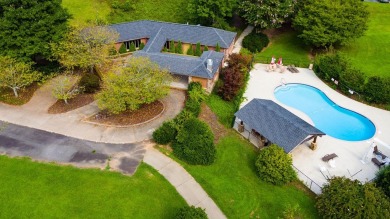 Beautifully wooded Lot located in the upscale community on Chatuge Shores Golf Course in North Carolina - for sale on GolfHomes.com, golf home, golf lot