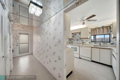 SPACIOUS 2/2 PENTHOUSE CORNER UNIT IN MANICURED 55+ LAKES OF on Inverrary Country Club in Florida - for sale on GolfHomes.com, golf home, golf lot