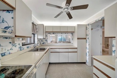 SPACIOUS 2/2 PENTHOUSE CORNER UNIT IN MANICURED 55+ LAKES OF on Inverrary Country Club in Florida - for sale on GolfHomes.com, golf home, golf lot