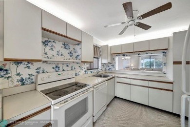 SPACIOUS 2/2 PENTHOUSE CORNER UNIT IN MANICURED 55+ LAKES OF on Inverrary Country Club in Florida - for sale on GolfHomes.com, golf home, golf lot