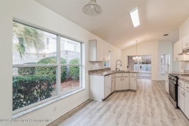 UPDATED, delightful 2 bedroom, PLUS a flex room, 2 bath, 1400+/- on Twisted Oaks Golf Club in Florida - for sale on GolfHomes.com, golf home, golf lot