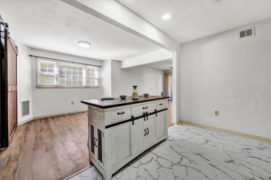This move-in ready 2 bedroom, 2 bath flat is nestled in on Hunting Hills Country Club in Virginia - for sale on GolfHomes.com, golf home, golf lot