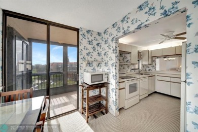 SPACIOUS 2/2 PENTHOUSE CORNER UNIT IN MANICURED 55+ LAKES OF on Inverrary Country Club in Florida - for sale on GolfHomes.com, golf home, golf lot