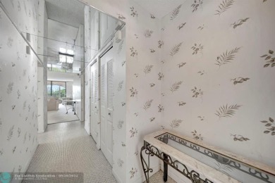 SPACIOUS 2/2 PENTHOUSE CORNER UNIT IN MANICURED 55+ LAKES OF on Inverrary Country Club in Florida - for sale on GolfHomes.com, golf home, golf lot
