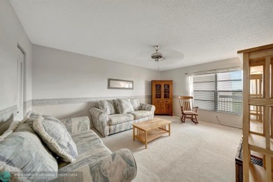 SPACIOUS 2/2 PENTHOUSE CORNER UNIT IN MANICURED 55+ LAKES OF on Inverrary Country Club in Florida - for sale on GolfHomes.com, golf home, golf lot