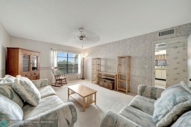 SPACIOUS 2/2 PENTHOUSE CORNER UNIT IN MANICURED 55+ LAKES OF on Inverrary Country Club in Florida - for sale on GolfHomes.com, golf home, golf lot