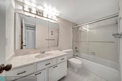 SPACIOUS 2/2 PENTHOUSE CORNER UNIT IN MANICURED 55+ LAKES OF on Inverrary Country Club in Florida - for sale on GolfHomes.com, golf home, golf lot