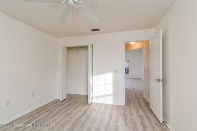 UPDATED, delightful 2 bedroom, PLUS a flex room, 2 bath, 1400+/- on Twisted Oaks Golf Club in Florida - for sale on GolfHomes.com, golf home, golf lot