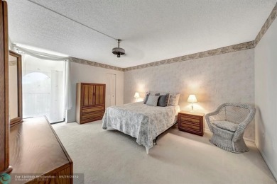 SPACIOUS 2/2 PENTHOUSE CORNER UNIT IN MANICURED 55+ LAKES OF on Inverrary Country Club in Florida - for sale on GolfHomes.com, golf home, golf lot