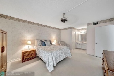 SPACIOUS 2/2 PENTHOUSE CORNER UNIT IN MANICURED 55+ LAKES OF on Inverrary Country Club in Florida - for sale on GolfHomes.com, golf home, golf lot