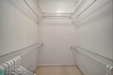SPACIOUS 2/2 PENTHOUSE CORNER UNIT IN MANICURED 55+ LAKES OF on Inverrary Country Club in Florida - for sale on GolfHomes.com, golf home, golf lot