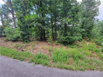 This lot is located in a very desirable part of Bella Vista near on Bella Vista - Metfield Golf Complex and Country Club in Arkansas - for sale on GolfHomes.com, golf home, golf lot