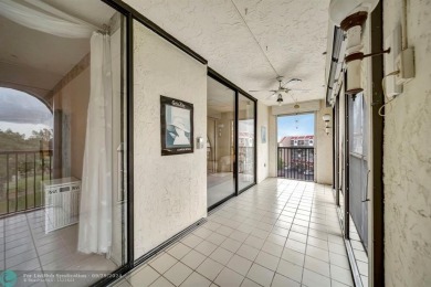 SPACIOUS 2/2 PENTHOUSE CORNER UNIT IN MANICURED 55+ LAKES OF on Inverrary Country Club in Florida - for sale on GolfHomes.com, golf home, golf lot