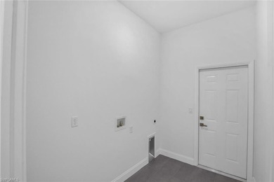 One or more photo(s) has been virtually staged, AI generated or on Rotonda Golf and Country Club The Palms Course in Florida - for sale on GolfHomes.com, golf home, golf lot