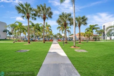 SPACIOUS 2/2 PENTHOUSE CORNER UNIT IN MANICURED 55+ LAKES OF on Inverrary Country Club in Florida - for sale on GolfHomes.com, golf home, golf lot