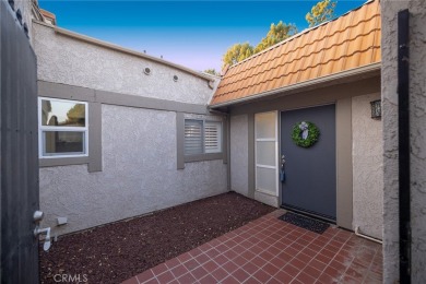 Wake up to the quiet hum of Indian Hills Golf Course and end the on Indian Hills Country Club in California - for sale on GolfHomes.com, golf home, golf lot