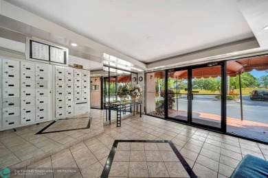 SPACIOUS 2/2 PENTHOUSE CORNER UNIT IN MANICURED 55+ LAKES OF on Inverrary Country Club in Florida - for sale on GolfHomes.com, golf home, golf lot