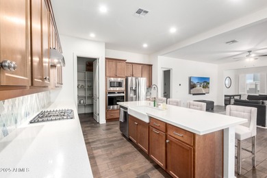 Deluxe urban living. The Cranston's inviting covered entry and on Sterling Grove Golf & Country Club in Arizona - for sale on GolfHomes.com, golf home, golf lot