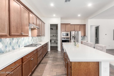 Deluxe urban living. The Cranston's inviting covered entry and on Sterling Grove Golf & Country Club in Arizona - for sale on GolfHomes.com, golf home, golf lot