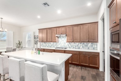 Deluxe urban living. The Cranston's inviting covered entry and on Sterling Grove Golf & Country Club in Arizona - for sale on GolfHomes.com, golf home, golf lot