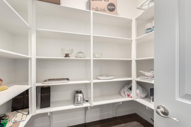 Deluxe urban living. The Cranston's inviting covered entry and on Sterling Grove Golf & Country Club in Arizona - for sale on GolfHomes.com, golf home, golf lot