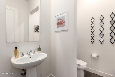 Deluxe urban living. The Cranston's inviting covered entry and on Sterling Grove Golf & Country Club in Arizona - for sale on GolfHomes.com, golf home, golf lot