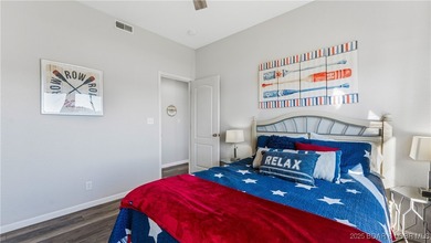 Enjoy incredible lake views from this spacious 4-bedroom, 3-bath on Tan-Tar-A Golf Club in Missouri - for sale on GolfHomes.com, golf home, golf lot