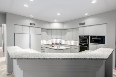 Located at 7873 E Gold Dust Ave, Scottsdale, AZ, this 5 bedroom on Gainey Ranch Golf Club in Arizona - for sale on GolfHomes.com, golf home, golf lot