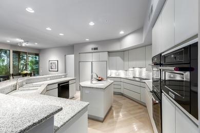 Located at 7873 E Gold Dust Ave, Scottsdale, AZ, this 5 bedroom on Gainey Ranch Golf Club in Arizona - for sale on GolfHomes.com, golf home, golf lot