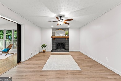Discover this beautifully maintained brick 4-bedroom, 2.5-bath on Canongate At Flat Creek Club in Georgia - for sale on GolfHomes.com, golf home, golf lot