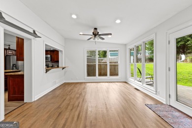 Discover this beautifully maintained brick 4-bedroom, 2.5-bath on Canongate At Flat Creek Club in Georgia - for sale on GolfHomes.com, golf home, golf lot