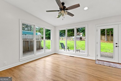 Discover this beautifully maintained brick 4-bedroom, 2.5-bath on Canongate At Flat Creek Club in Georgia - for sale on GolfHomes.com, golf home, golf lot