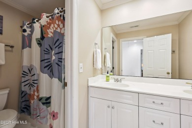 Elegant 4BR/2.5BA brick home in Landfall with private pond views on Country Club of Landfall in North Carolina - for sale on GolfHomes.com, golf home, golf lot