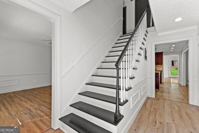 Discover this beautifully maintained brick 4-bedroom, 2.5-bath on Canongate At Flat Creek Club in Georgia - for sale on GolfHomes.com, golf home, golf lot