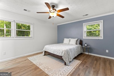 Discover this beautifully maintained brick 4-bedroom, 2.5-bath on Canongate At Flat Creek Club in Georgia - for sale on GolfHomes.com, golf home, golf lot