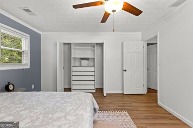 Discover this beautifully maintained brick 4-bedroom, 2.5-bath on Canongate At Flat Creek Club in Georgia - for sale on GolfHomes.com, golf home, golf lot