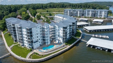 Enjoy incredible lake views from this spacious 4-bedroom, 3-bath on Tan-Tar-A Golf Club in Missouri - for sale on GolfHomes.com, golf home, golf lot
