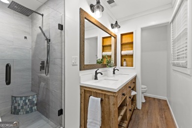 Discover this beautifully maintained brick 4-bedroom, 2.5-bath on Canongate At Flat Creek Club in Georgia - for sale on GolfHomes.com, golf home, golf lot