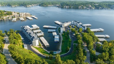 Enjoy incredible lake views from this spacious 4-bedroom, 3-bath on Tan-Tar-A Golf Club in Missouri - for sale on GolfHomes.com, golf home, golf lot