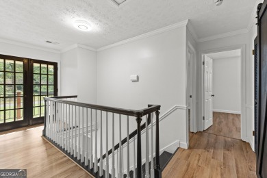 Discover this beautifully maintained brick 4-bedroom, 2.5-bath on Canongate At Flat Creek Club in Georgia - for sale on GolfHomes.com, golf home, golf lot