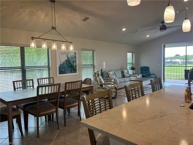 TURNKEY! WATER + GOLF VIEWS! END UNIT CONDO IN DEL WEBB NAPLES on Panther Run Golf Club in Florida - for sale on GolfHomes.com, golf home, golf lot