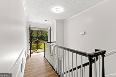 Discover this beautifully maintained brick 4-bedroom, 2.5-bath on Canongate At Flat Creek Club in Georgia - for sale on GolfHomes.com, golf home, golf lot