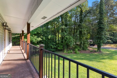 Discover this beautifully maintained brick 4-bedroom, 2.5-bath on Canongate At Flat Creek Club in Georgia - for sale on GolfHomes.com, golf home, golf lot