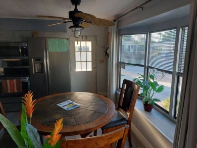The Lot Rent for this home is $1,047.00/monthly. A cozy on Lake Fairways Country Club in Florida - for sale on GolfHomes.com, golf home, golf lot